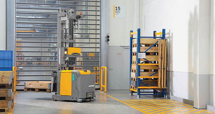 Jungheinrich automated stacker with pallet in warehouse